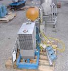 USED:Busch Huckepack once-through-sealing vacuum pump, rotary vane,type 433:014, rated 200 cfm. Driven by a 20 hp 3/60/230/460 volt  745 rpm XP motor. Skid mounted.