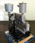Used Leybold-Heraeus Two Stage Rotary Piston Vacuum Pump, 117.8 CFM, Model DK200, Carbon Steel. Driven by a 7.5hp, 3/60/230/460 volt, 1755 rpm motor. Mounted on a base with casters. Serial# 895031179...