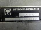 Used Leybold-Heraeus Two Stage Rotary Piston Vacuum Pump, 117.8 CFM, Model DK200, Carbon Steel. Driven by a 7.5hp, 3/60/230/460 volt, 1755 rpm motor. Mounted on a base with casters. Serial# 895031179...