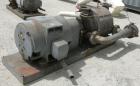 Used Nash Vacuum Pump, Type CL1003. Approximately 330 cfm at 100 mm hg, carbon steel. Test number 83U0431. 690 rpm. Driven by a 50 hp, 3/60/230/460 volt, 705 rpm motor. Base mounted.