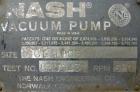 Used Nash Vacuum Pump, Type CL1003. Approximately 330 cfm at 100 mm hg, carbon steel. Test number 83U0431. 690 rpm. Driven by a 50 hp, 3/60/230/460 volt, 705 rpm motor. Base mounted.