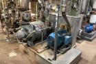 Used Nash Engineering Company Vacuum Pump, Model CL1003. Stainless steel vacuum pump. 50 HP. approximate 330 CFM. On base with 50 HP/230-460/3/60 motor drive.