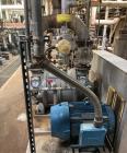 Used Nash Engineering Company Vacuum Pump, Model CL1003. Stainless steel vacuum pump. 50 HP. approximate 330 CFM. On base with 50 HP/230-460/3/60 motor drive.