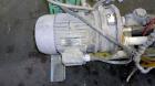 Used Nash Liquid Ring Vacuum Pump, Size MHF-80, Carbon Steel.  Approximately 70 cfm.  Driven by a 5 hp, 3/60/230/460 volt, 1715 rpm motor.  Mounted on a carbon steel frame with casters.  Test #82U384...
