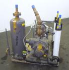 Used Nash Liquid Ring Vacuum Pump, Size SC4/7, Carbon Steel.  Flow rate of 10 gallons per minute 25 to 28