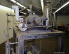 Used Nash Two Stage Liquid Ring Vacuum Pump, Model TCM1/5, Carbon Steel. Approximate 100 CFM. Driven by a 10hp, 3/60/460 volt, 1755 rpm motor. Includes a tank. Base mounted. Built 2002.