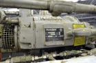 Used Nash Two Stage Liquid Ring Vacuum Pump, Model TCM1/5, Carbon Steel. Approximate 100 CFM. Driven by a 10hp, 3/60/460 volt, 1755 rpm motor. Includes a tank. Base mounted. Built 2002.