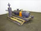 Used Nash Two Stage Liquid Ring Vacuum Pump, Model TCM1/7, Carbon Steel.