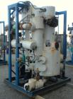 Used Apovac Vacuum System consisting of: (1) Vacuum pump, driven by a 30 hp motor. (1) Industrial Piping heat exchanger, (1) Industrial Piping pressure tank, and a control panel. Mounted on a carbon ...