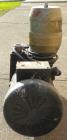 Used Sargent-Welch DirecTorr Vacuum Pump, Model 8821A, Rated 7 CFM. Driven by a 1/2 HP, 1/60/115/208-230 Volt, 1725 RPM motor. Includes a top mounted filter.