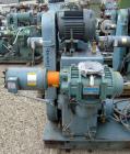Used Stokes Microvac Rotary Piston Vacuum Pump, model 212-11, carbon steel. Approximately 150 cfm. 3'' inlet, 2'' outlet. Driven by a 7 1/2 hp, 3/60/208-230/460 volt, 1760 rpm motor. Includes a Stoke...