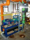 Used Travaini Two Stage Liquid Ring Vacuum pump, model TRHC40-190-C-A3, 316 stainless steel. Approximately 111 cfm.         1 1/2