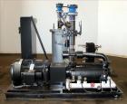 Used- Travaini Vacuum System, Model TRW1000H-FR, Carbon Steel. Consisting of Travaini vacuum pump, model TRHE100-1600/X-C/F,...