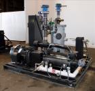 Used Travaini Vacuum System, Model TRW1000H-FR, Carbon Steel. Consisting of Travaini vacuum pump, model TRHE100-1600/X-C/F, serial #AN214-FDPKG, approximately 1000 CFM, 4