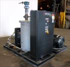 Used- Travaini Vacuum System, Model TRW1000H-FR, Carbon Steel. Consisting of Travaini vacuum pump, model TRHE100-1600/X-C/F,...