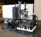 Used Travaini Vacuum System, Model TRW1000H-FR, Carbon Steel. Consisting of Travaini vacuum pump, model TRHE100-1600/X-C/F, serial #AC469-M0PXI, approximately 1000 CFM, 4