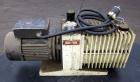 Used Varian Dual Stage Rotary Vane Vacuum Pump, Model SD-700, Part# 0424-P1241-301, Carbon Steel. Approximate 24 cfm. Driven by a 1.5hp, 1/60/115/230 volt, 1735 rpm motor.