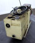 Used Varian Dual Stage Rotary Vane Vacuum Pump, Model SD-700, Part# 0424-P1241-301, Carbon Steel. Approximate 24 cfm. Driven by a 1.5hp, 1/60/115/230 volt, 1735 rpm motor.
