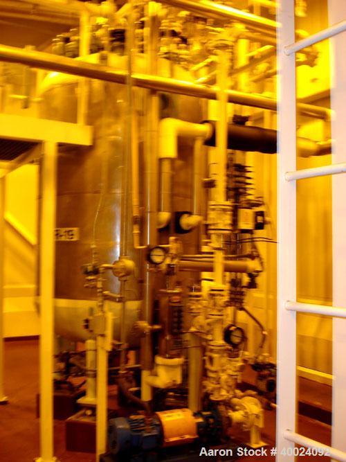 Used: Alloy Fab reactor, 750 gallon,hastelloy C276, vertical. 54" diameter x 70" straight side,2:1 clamp on elliptical top, elliptical bottom. Internal rated 100 psi/fv at 450 deg.f.,304 stainless st...