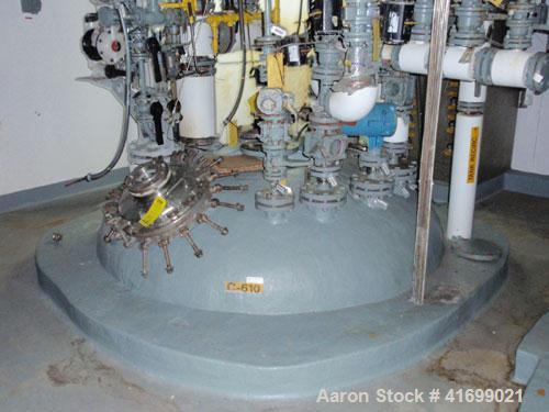Used Reactor, 1500 Gallon, Hastelloy C22, vertical. 78" diameter x 76" straight side, dished top, slight coned bottom. (3) baffles. Openings: top 3", (3) 4", (2) 6", (3) 8", 18" manway; 3" center bot...