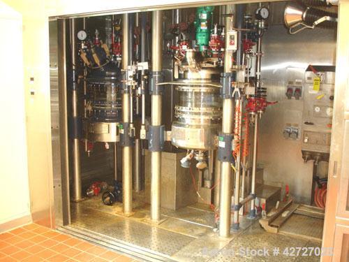 Used Northland Stainless Reactor Train, 50 Liter (13.2 Gallon). With 50 liter Hastelloy C22 reactor, removable dish top, dish bottom, intermediate QVF glass mid section, rated 150 psi and full vacuum...