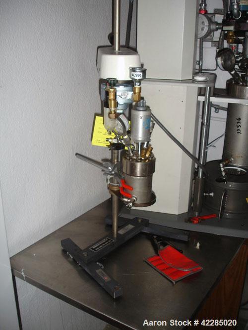 Used Parr Lab Size Reactor, 300 Milliliters (0.07 gallon), Hastelloy C. Internal rated 3000 psi at 350 deg F. Jacket rated 100 psi at 350 deg F. Mounted on a stand with a Parr magnetic agitator drive...