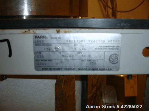 Used Parr Reactor, 5 Gallon, Hastelloy C. Internal rated 2000 psi at 350 deg F. Electrically heated. Mounted on a  stand with a Parr magnetic agitator drive. Serial  #4555. Price includes 15% buyer's...