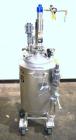 Used Alloy Products Reactor, 10 Gallon, Hastelloy C-22, Vertical. Approximately 12’’ diameter x 21’’ straight side, dished top and bottom. Internal rated 125 psi at -20 to 300 degrees F, 304 dimple j...