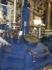 Used Graham Hart Reactor, approximately 1321 gallon (5,000 liter), Hastelloy C22, vertical. Internal rated 6 bar/full vacuum (87 psi/FV) at -90 to 200 deg C (-130 to 392 F). External coil jacket rate...