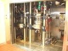 Used Northland Stainless Reactor Train, 50 Liter (13.2 Gallon). With 50 liter Hastelloy C22 reactor, removable dish top, dish bottom, intermediate QVF glass mid section, rated 150 psi and full vacuum...