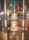 Used Northland Stainless Reactor Train, 50 Liter (13.2 Gallon). With 50 liter Hastelloy C22 reactor, removable dish top, dish bottom, intermediate QVF glass mid section, rated 150 psi and full vacuum...