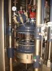 Used Northland Stainless Reactor Train, 50 Liter (13.2 Gallon). With 50 liter Hastelloy C22 reactor, removable dish top, dish bottom, intermediate QVF glass mid section, rated 150 psi and full vacuum...