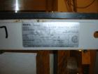 Used Parr Reactor, 5 Gallon, Hastelloy C. Internal rated 2000 psi at 350 deg F. Electrically heated. Mounted on a  stand with a Parr magnetic agitator drive. Serial  #4555. Price includes 15% buyer's...