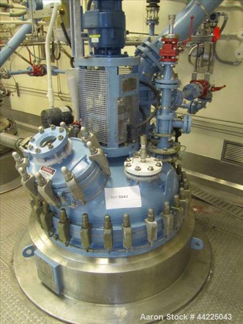 Used Tycon Glass Lined Reactor, 200 Gallon, Type 808 Glass. Internal rated 150 psi and full vacuum at 450 degrees F, jacket rated 150 psi and full vacuum at 450 degrees F. Full clamp top, 3 blade ret...