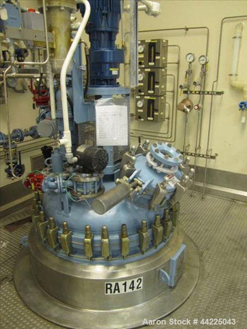 Used Tycon Glass Lined Reactor, 200 Gallon, Type 808 Glass. Internal rated 150 psi and full vacuum at 450 degrees F, jacket rated 150 psi and full vacuum at 450 degrees F. Full clamp top, 3 blade ret...