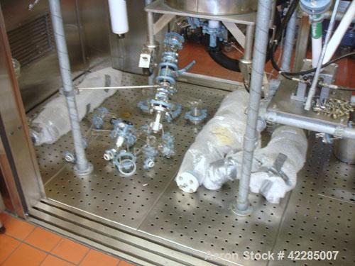 Used Buchi Reactor Train consisting of: (1) Buchi 100 Liter Glass Reactor, (1) Buchi 100 Liter Glass Agitated Receiver, (2) Vertical Glass Coil Condensers, (1) Vertical Coil Vent Condenser. 