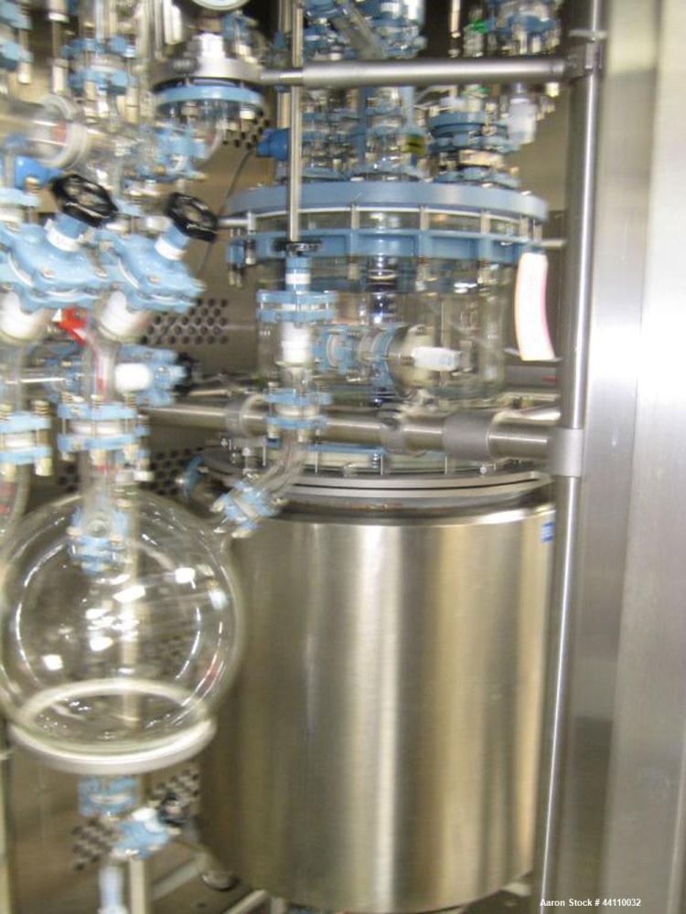 Used Buchi Glass Reactor, 100 Liter (26.4 Gallon). Internal rated +0.4/-1.0 bar at +200/-85 degrees C, jacket rated +10/-1.0 bar at +200/-85 degrees C. Bolted glass dished top and bottom. 3-blade tur...