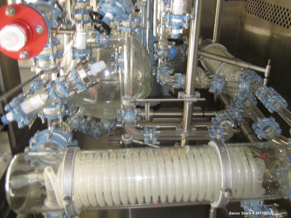 Used Buchi Glass Reactor, 100 Liter (26.4 Gallon). Internal rated +0.4/-1.0 bar at +200/-85 degrees C, jacket rated +10/-1.0 bar at +200/-85 degrees C. Bolted glass dished top and bottom. 3-blade tur...