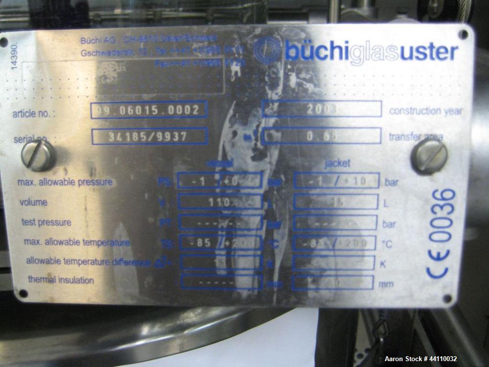 Used Buchi Glass Reactor, 100 Liter (26.4 Gallon). Internal rated +0.4/-1.0 bar at +200/-85 degrees C, jacket rated +10/-1.0 bar at +200/-85 degrees C. Bolted glass dished top and bottom. 3-blade tur...