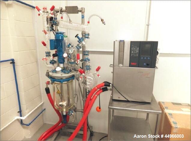 Unused Buchi Glass Mini Pilot 10  System consisting of: Glass reactor vessel 10 litres, stirrer unit, scaffolding complete , stainless steel (floor version) documentation, assembled.  Dimensions 1.9 ...