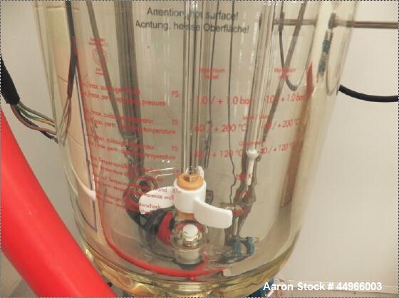 Unused Buchi Glass Mini Pilot 10  System consisting of: Glass reactor vessel 10 litres, stirrer unit, scaffolding complete , stainless steel (floor version) documentation, assembled.  Dimensions 1.9 ...