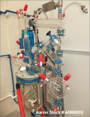 Unused Buchi Glass Mini Pilot 10  System consisting of: Glass reactor vessel 10 litres, stirrer unit, scaffolding complete , stainless steel (floor version) documentation, assembled.  Dimensions 1.9 ...