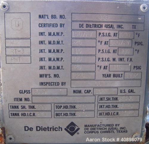 Used DeDietrich Clamp Top Glass Lined Reactor, 100 gallon, 3009 white glass with calibration lines, vertical. Approximately 30’’ diameter x 30’’ straight side, dished bolt on top, dish bottom. Intern...