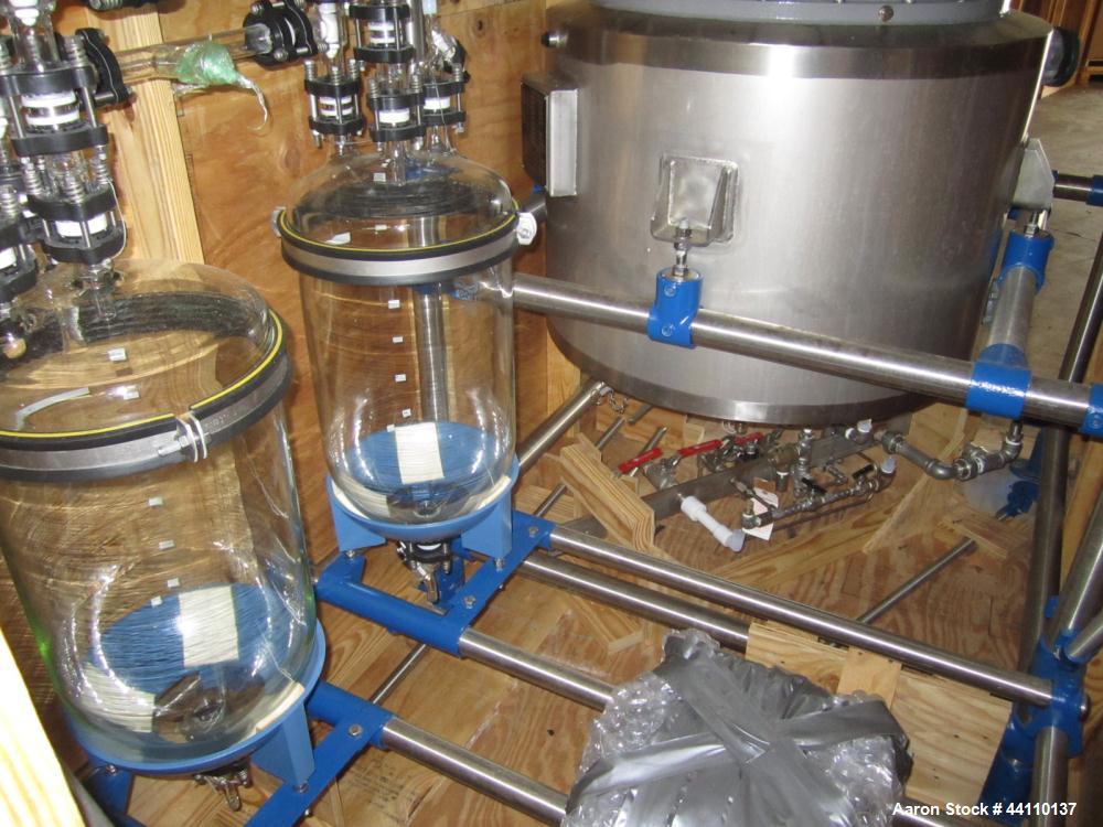 Unused- DeDietrich Glass Lined Reactor, 100 Liter (26.4 Gallon). Rated 15 psi and full vacuum at 482 F internal, jacket rated 145 psi and full vacuum at 482 F. type 3009 Glass. QVF top. 304 Stainless...
