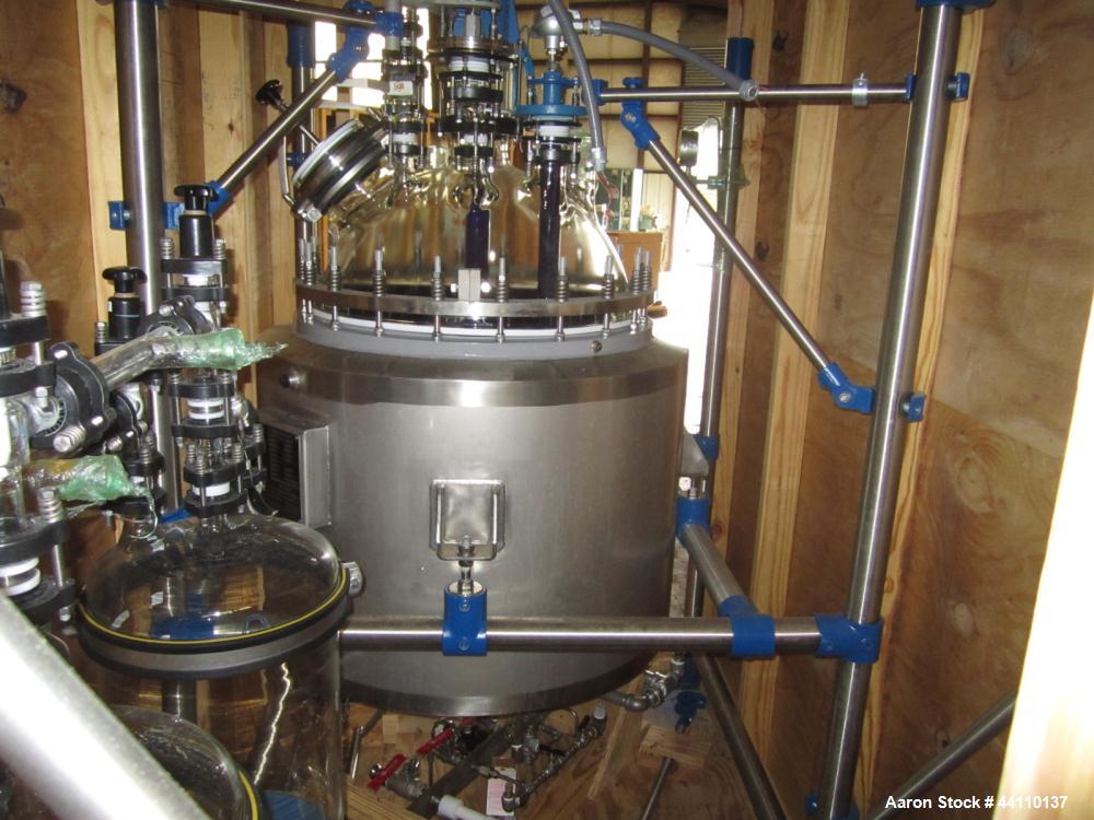 Unused- DeDietrich Glass Lined Reactor, 100 Liter (26.4 Gallon). Rated 15 psi and full vacuum at 482 F internal, jacket rated 145 psi and full vacuum at 482 F. type 3009 Glass. QVF top. 304 Stainless...