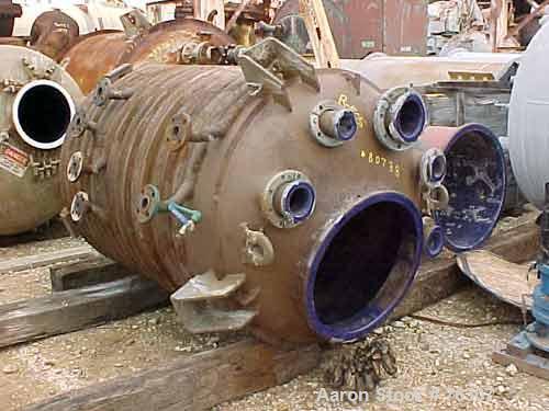 USED:Dedietrich glass lined reactor, 500 gallon, vertical. 48" diameter x 60" straight side, dish top and bottom. Internal rated 100 psi/fv at 500 deg F, 2 zone 1/2 pipe coil carbon steel jacket rate...