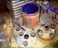 Used Glascote Glass Lined Reactor, 10 Gallon. 14" Diameter x 14" straight side, dished bottom, clamp down cover, internal pressure 25 psi, vessel has two covers: 1st cover having (1) 3" x 5" handway ...