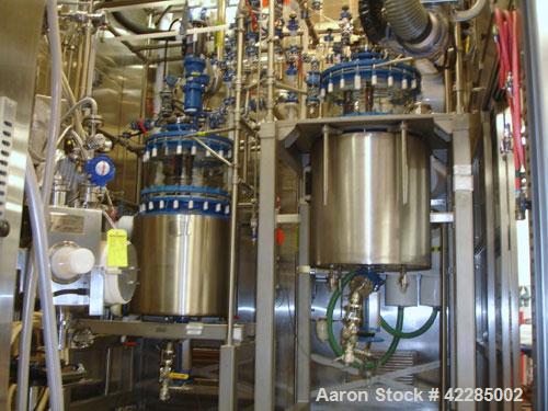 Used Buchi Reactor Train consisting of: (1) Buchi 250 liter glass reactor, 600mm diameter x 400mm straight side, removable dish top, dish bottom. Internal rated 4 psig and full vacuum at +200/-90 deg...