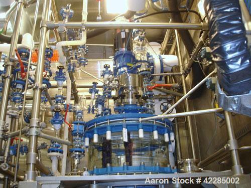 Used Buchi Reactor Train consisting of: (1) Buchi 250 liter glass reactor, 600mm diameter x 400mm straight side, removable dish top, dish bottom. Internal rated 4 psig and full vacuum at +200/-90 deg...