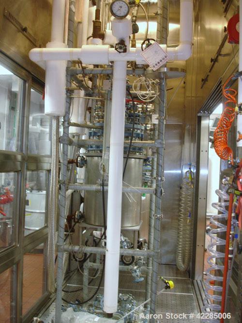 Used Buchi Reactor Train consisting of: (1) Buchi 70 liter glass reactor, removable dish top, dish bottom. Internal rated -1/+0.5 bar (-14.5/7.2 psig) +200/-50 deg C, jacket rated 10 bar (145 psig) a...